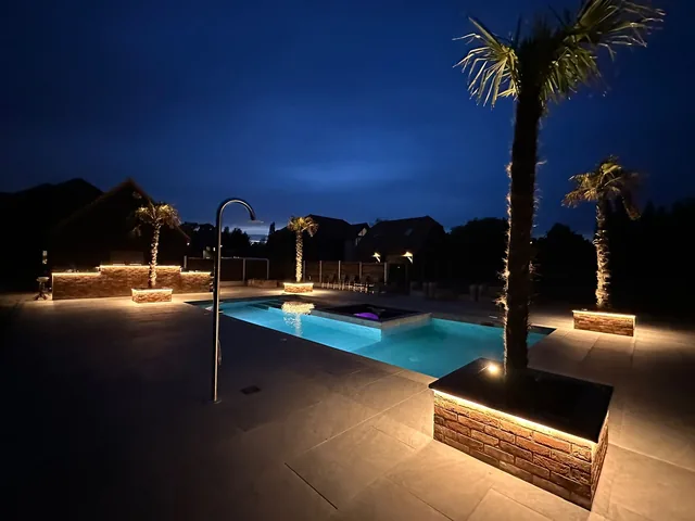 Lighting around an outdoor entertaining area, photographed after dark.